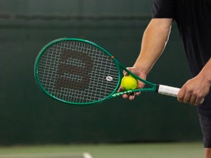 TW playtester hitting a serve. 