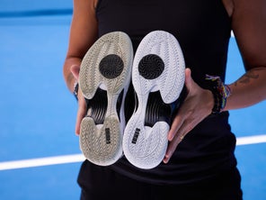 Image of a Playtester's Outsole Compared to a New Outsole