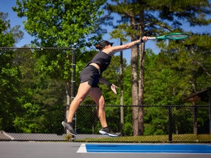 Image of a Playtester Hitting a Serve