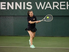Image of a Playtester Hitting a Backhand