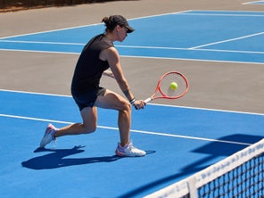 Image of a Playtester Hitting a Volley