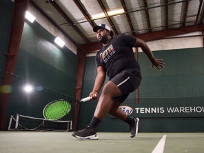 Image of a Playtester Hitting a Forehand