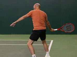 Image of a Playtester Hitting a Return of Serve