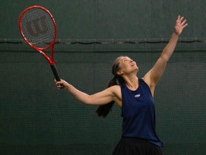 Image of a Playtester Hitting a Serve