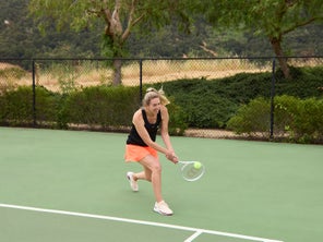 Image of Playtester Hitting a backhand