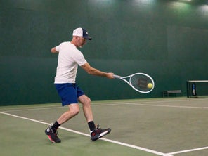 Image of a playtester hitting a forehand