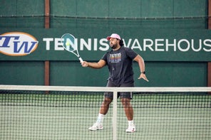 Image of a Playtester Hitting a Volley