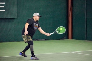 Image of a Playtester Hitting a Volley