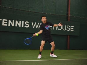 Image of a TW playtester hitting a return. 