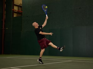 Image of a TW playtester hitting an overhead. 