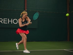 Image of a Playtester Hitting a Backhand