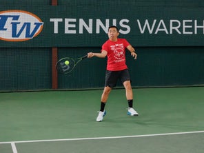 Image of a Playtester Hitting a Forehand