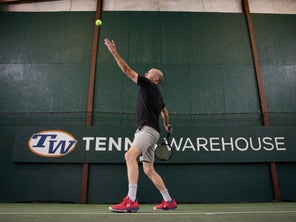 Image of a Playtester Hitting a Serve