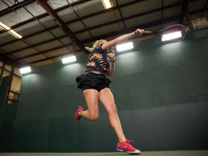 Image of a Playtester Hitting an Overhead