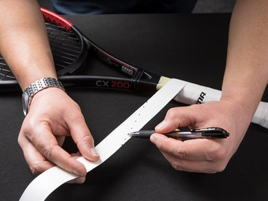 Changing the grip on a badminton racquet