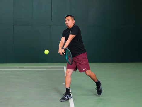 Jason leans into a backhand drive with the Blade 100. 