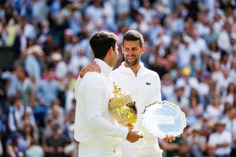 Djokovic and Alcaraz share a laugh after contesting a second consecutive Wimbledon final. 
