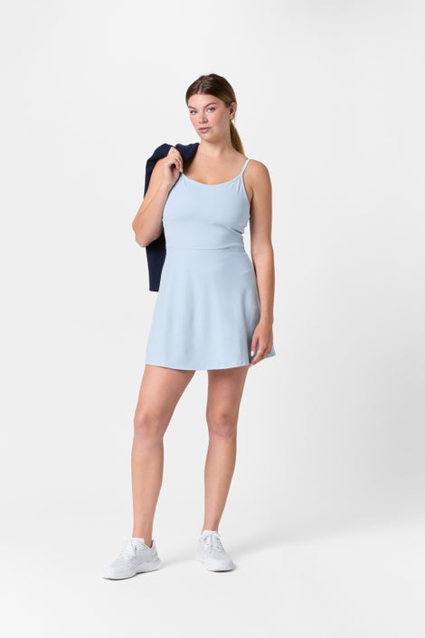 Model wearing light blue dress
