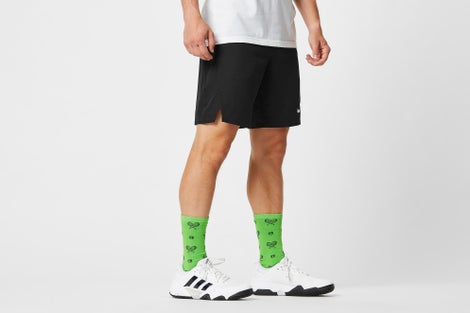 Pattern socks with white shoes