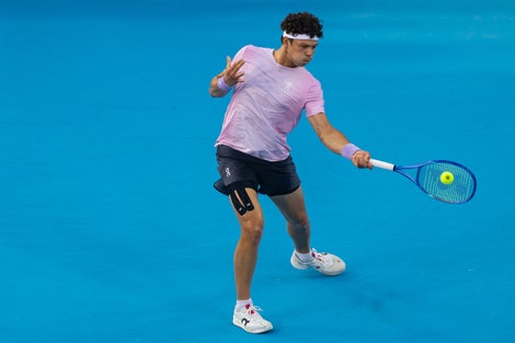 Ben Shelton whips through a forehand. 