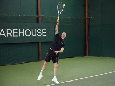 Image of a Playtester Hitting a Serve