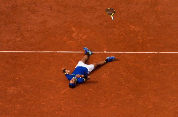 Nadal collapses after winning the French Open yet again. 