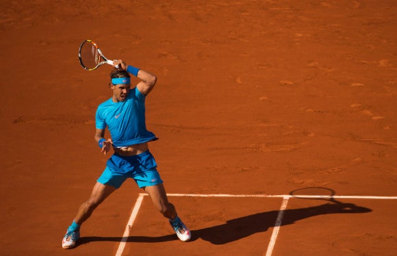 Nadal dances around a backhand to lasso a forehand.