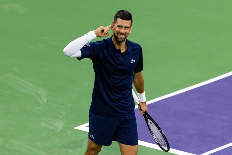 Image of Novak Djokovic stoking the crowd. 
