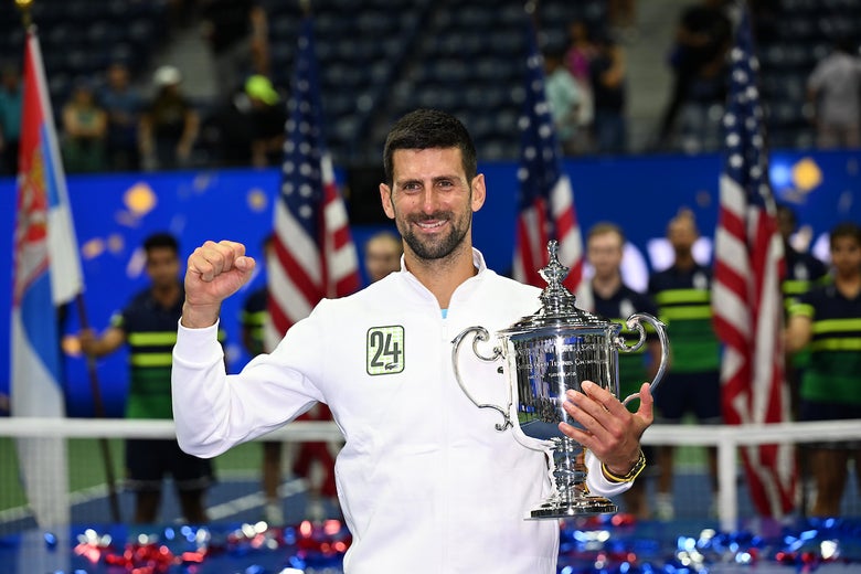 Image of Novak Djokovic with the US Open Trophy