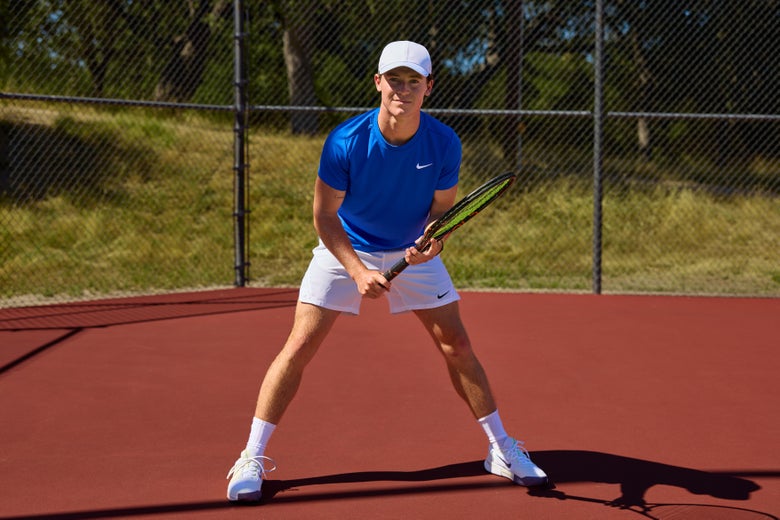 Nike Men's Top in royal blue with white tennis shorts.