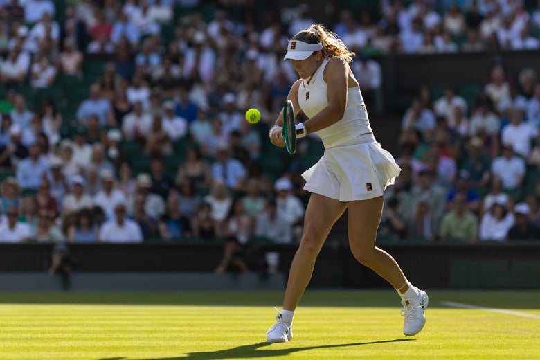 Andreeva smacks a backhand. 