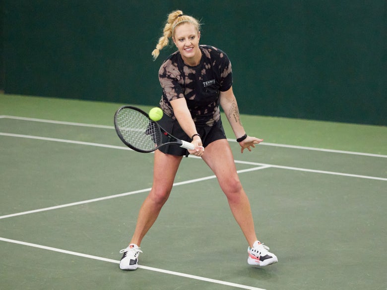 Playtester hitting a forehand volley