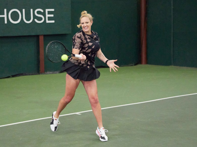 Playtester hitting a forehand