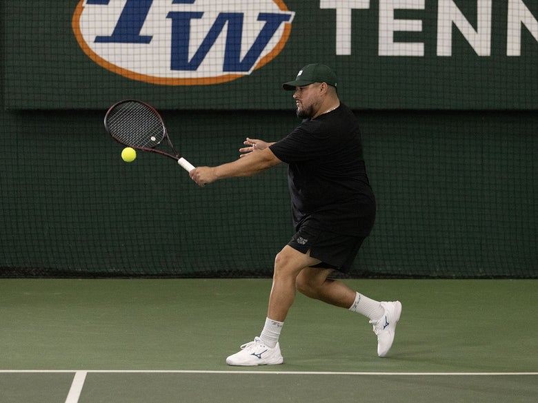 TW playtester hitting a backhand slice. 