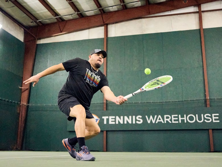 TW playtester hitting a volley with the 305s.
