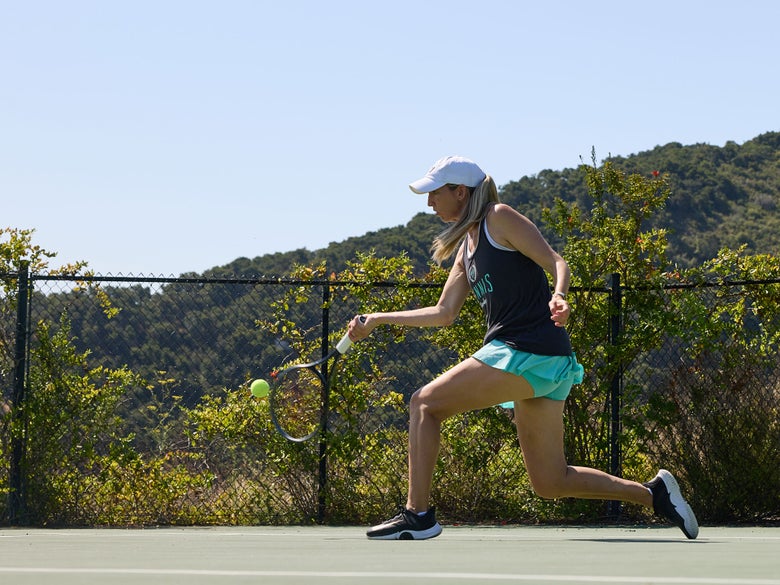 TW playtester hitting a forehand.