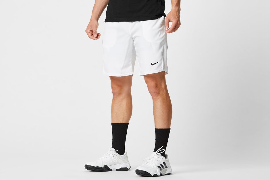 Black socks with white shoes. 
