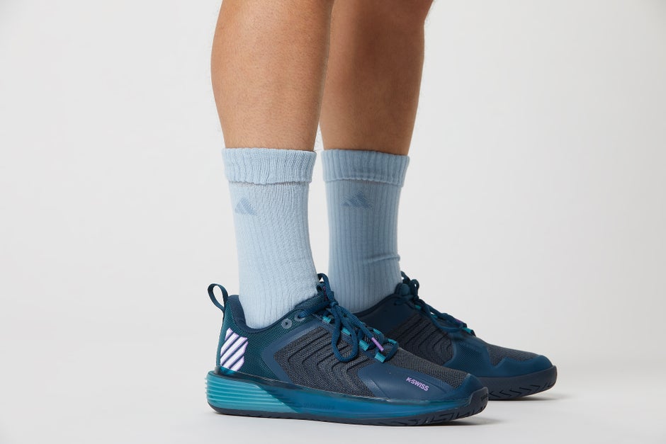 Light blue socks with dark blue shoes. 