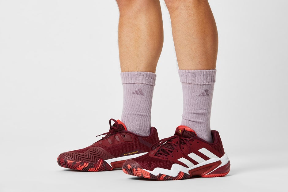 Lavender socks with red shoes. 
