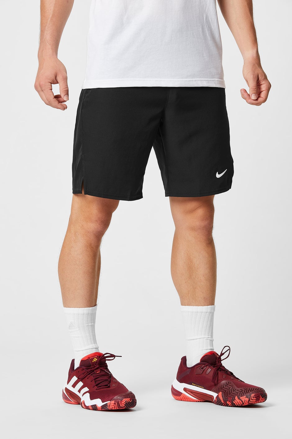White socks with red shoes. 