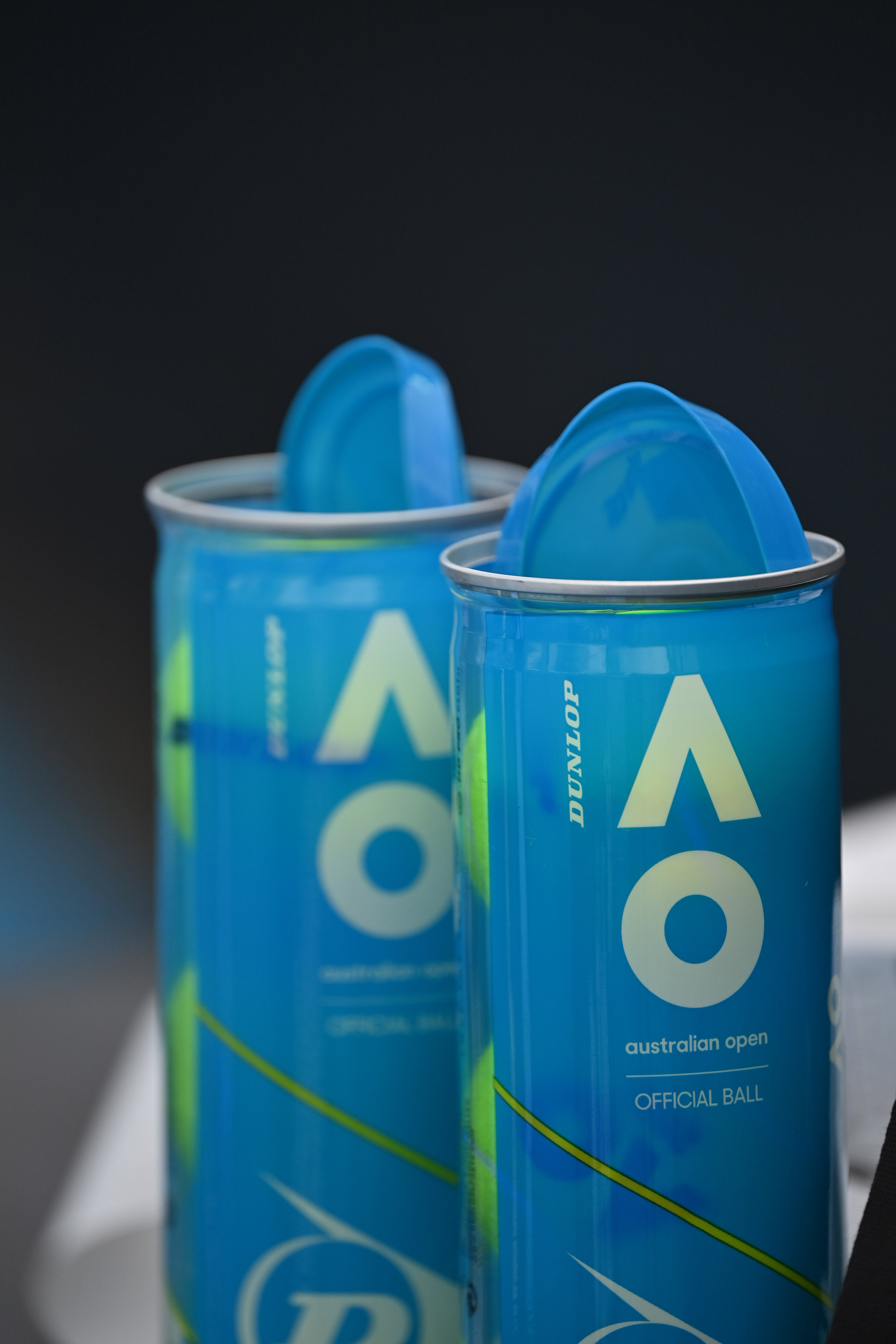 Open cans of Dunlop AO tennis balls.