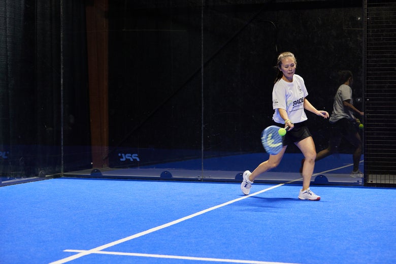 Image of a Padel Warehouse playtester catching up to a ball.