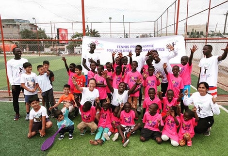 Image of children playing tennis