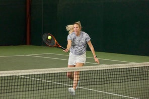 Image of playtester hitting a forehand volley