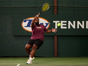 Image of a Playtester Hitting a Forehand