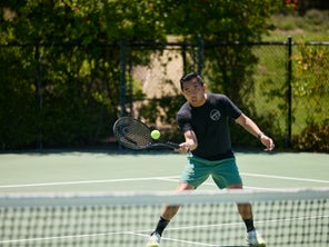 Image of a TW playtester hitting a volley.