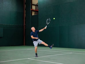 Image of a Playtester Hitting an Overhead