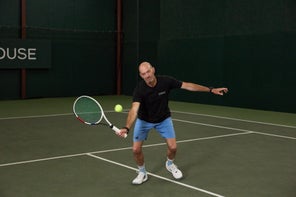 Image of a Playtester Hitting a Forehand Volley