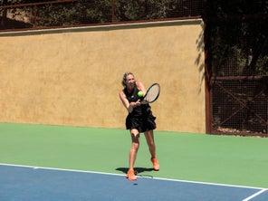 Image of a Playtester hitting a backhand
