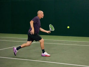 mage of playtester hitting a forehand volley